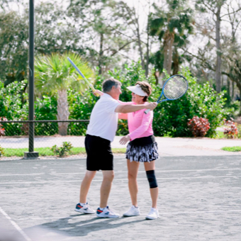 Members playing tennis at Fiddlesticks Country Club Fort Myers, Florida
